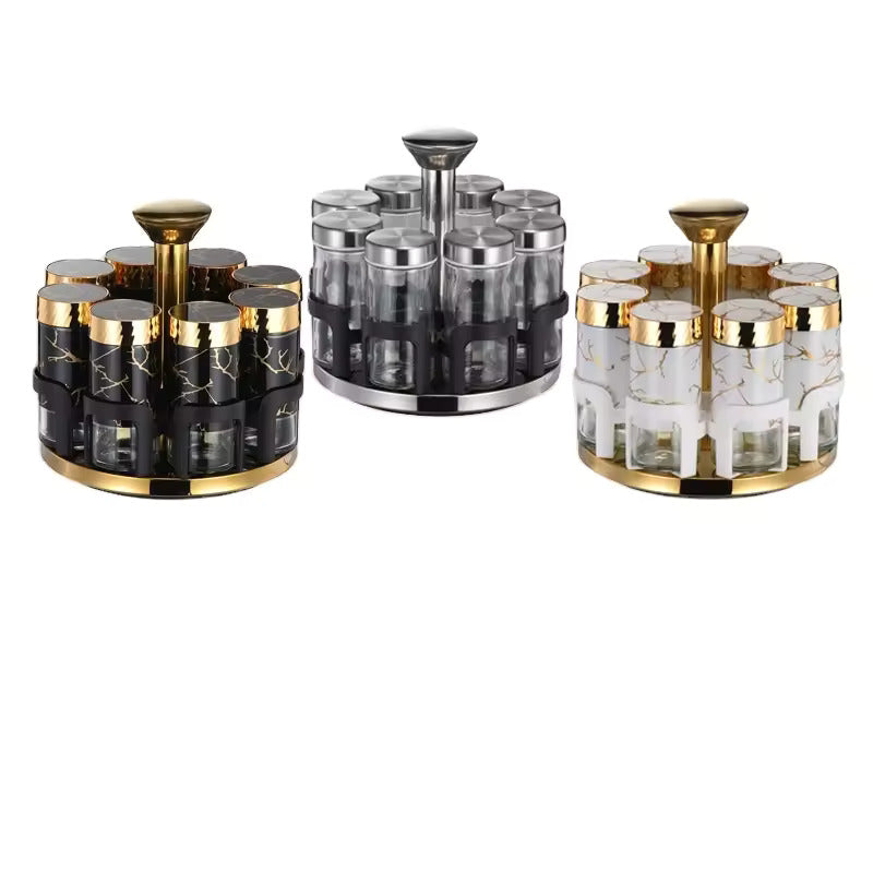 Set of three decorative canisters with gold and black accents on a white background