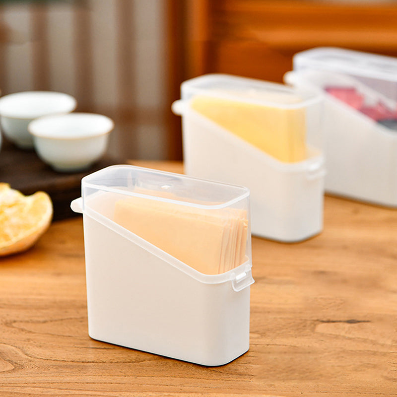 Butter dish with a stack of butter slices on a wooden surface