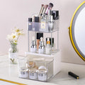 Cosmetic organizer with various items on a white surface