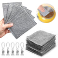 Set of gray scrubber pads with handles, shown in various settings.