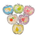 Set of six instant hand soap packs in apple-shaped containers with colorful labels.