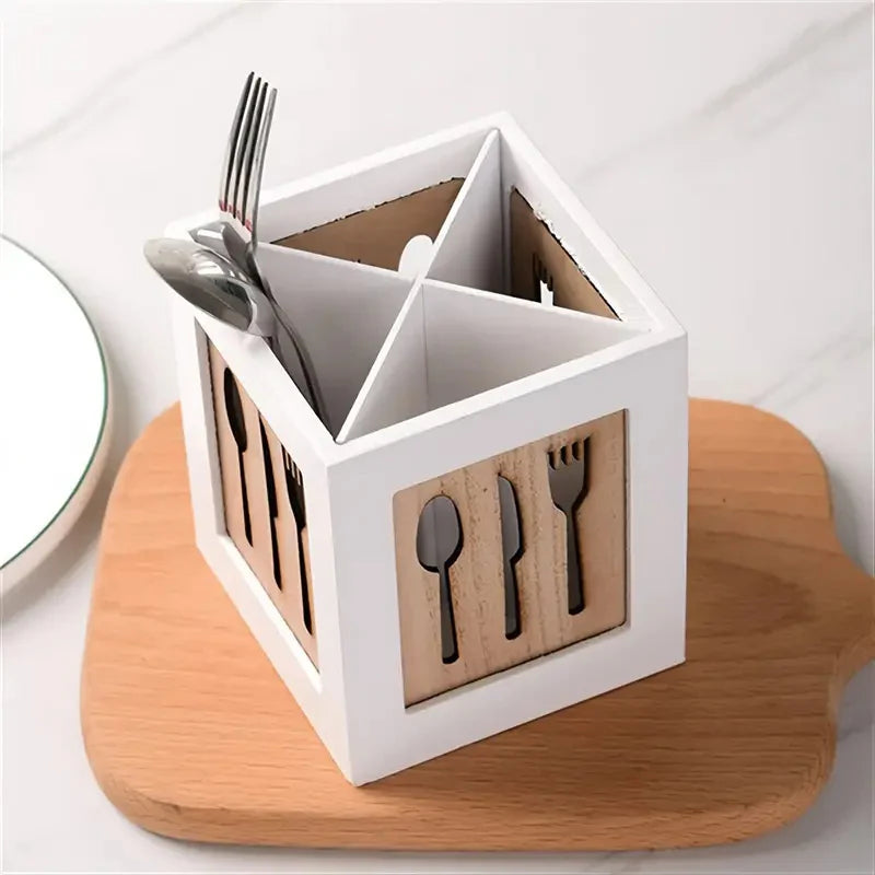 White and wooden cutlery holder with utensils on a white background