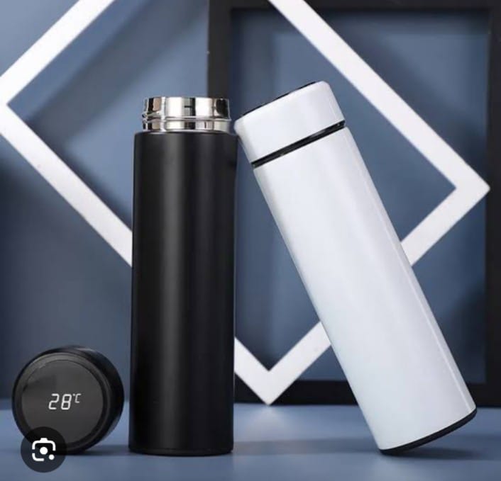 Black and white thermos bottles with digital temperature display on a geometric background