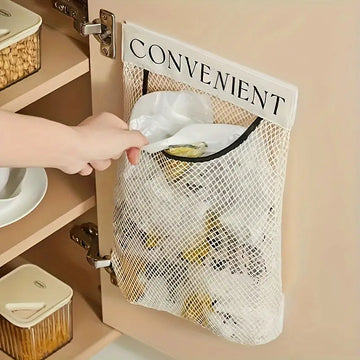 Hand reaching into a mesh bag labeled 'CONVENIENT' attached to a cabinet.