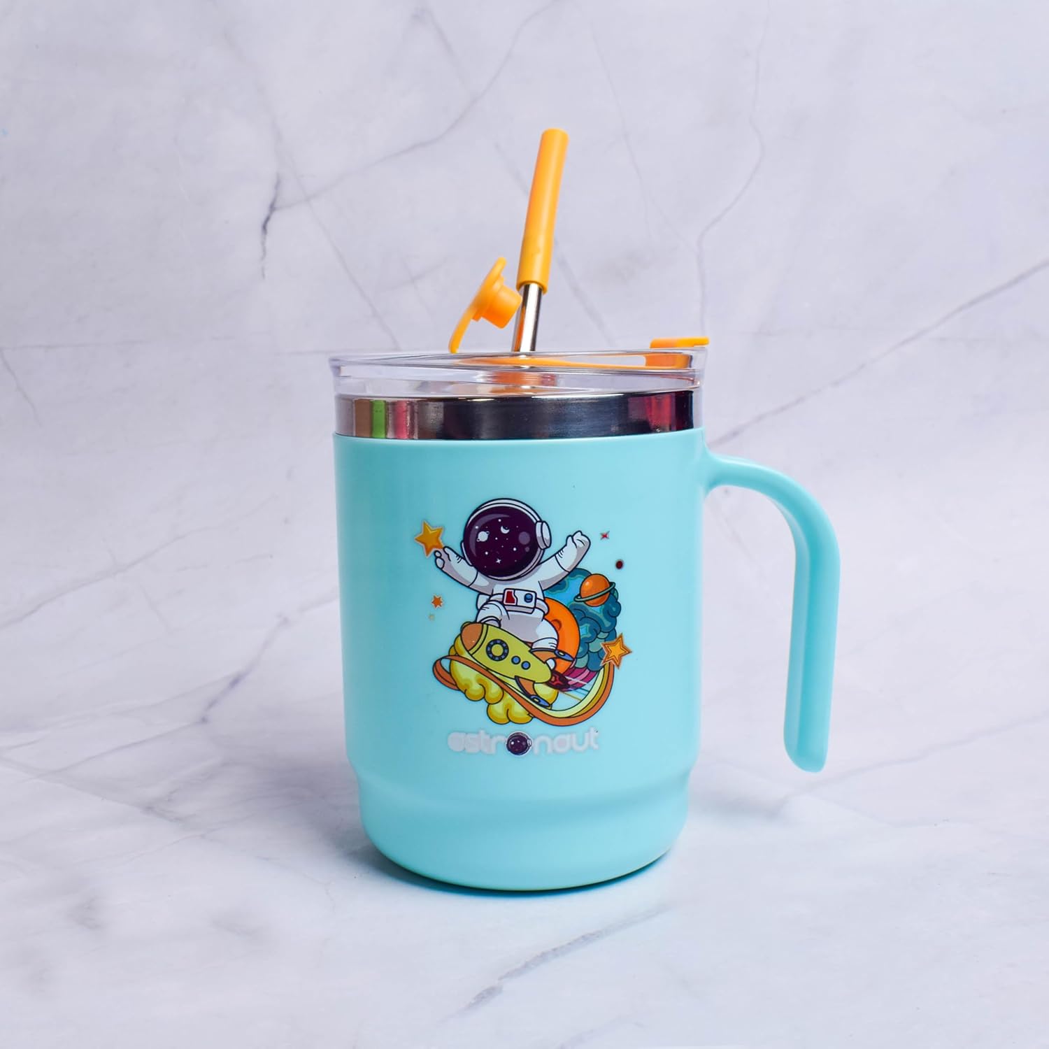 Turquoise mug with space-themed design and yellow straw on a light gray background