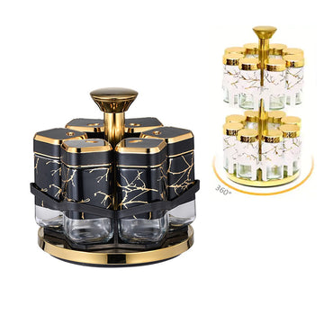 Spice rack with black and gold containers on a white background