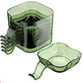 Green plastic kitchen tool set on a white background