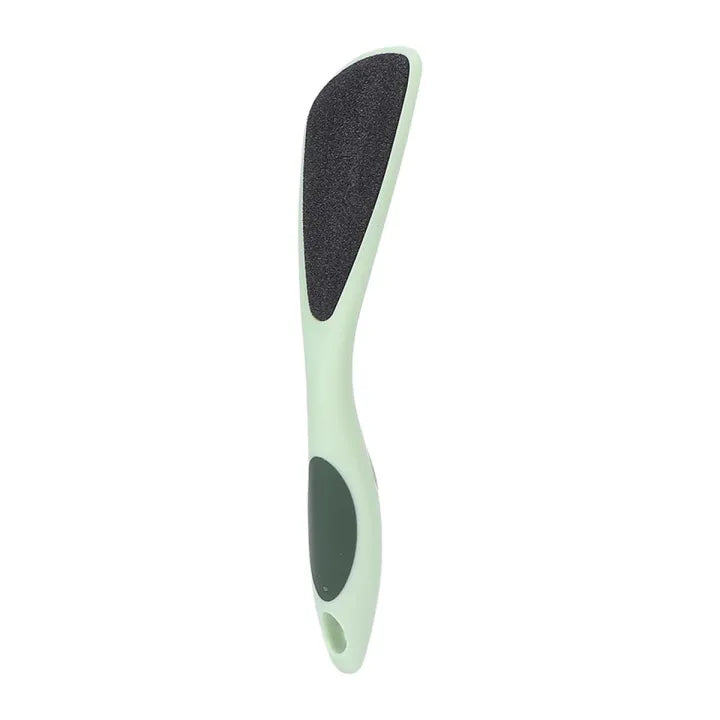Green foot file with black abrasive side on a white background