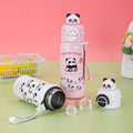 Pink panda-themed water bottle with a matching panda-shaped lid on a green surface.
