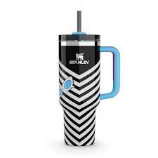 Travel mug with space-themed design on a white surface