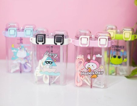 Set of clear water bottles with colorful cartoon designs on a pink background